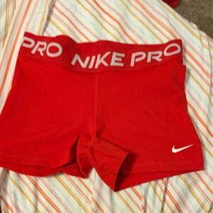 Nike Women's Athletic Shorts in Red